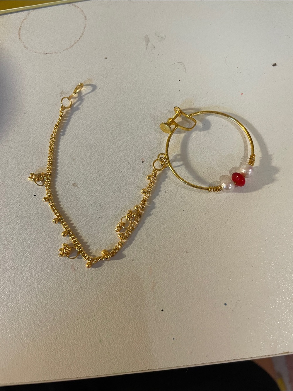 Gold-Tone Hoop Bracelet with Red Accent Bead